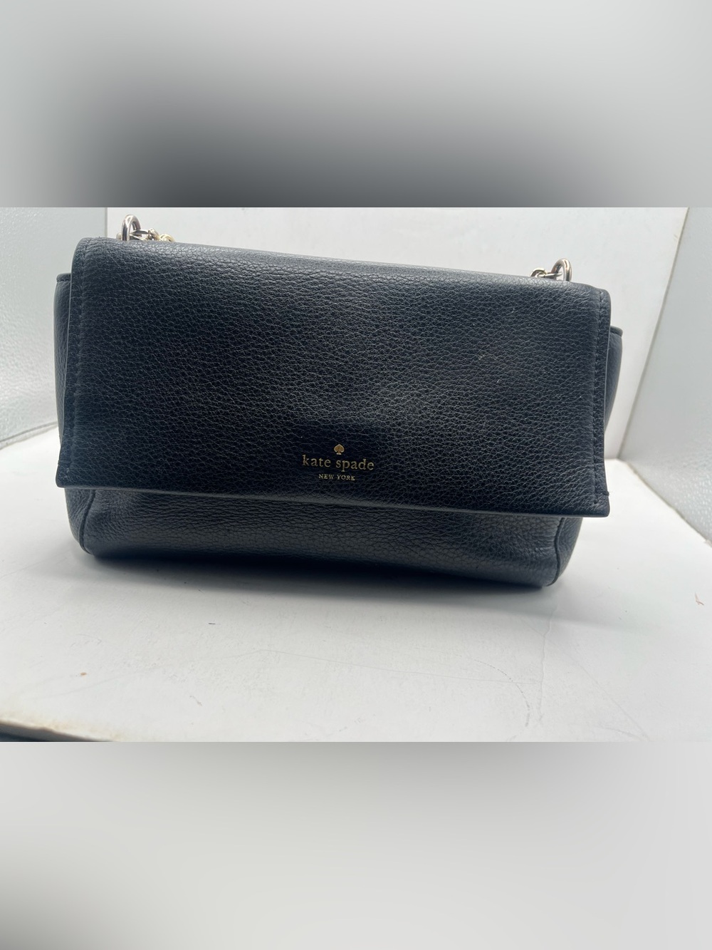 kate spade black pebbled leather crossbody with gold logo
